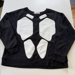 Black Sweatshirt with White Faux Leather Armor Design